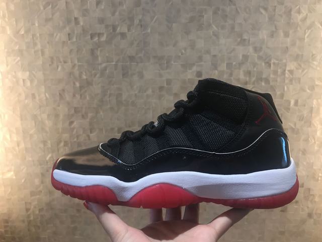 Air Jordan 11 Bred Black Red
