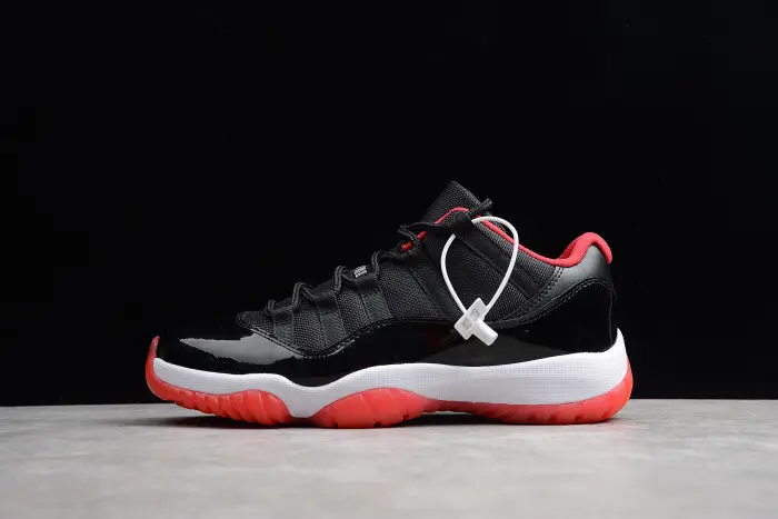 Air Jordan 11 Retro Low "Bred" Black/ Red mens 528895-012