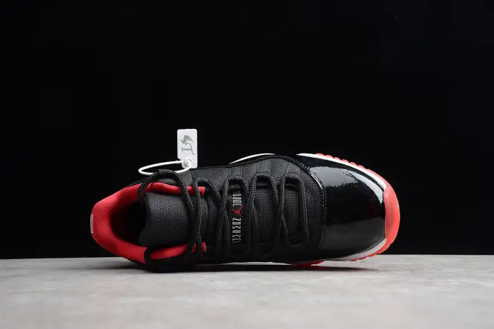 Air Jordan 11 Retro Low "Bred" Black/ Red mens 528895-012
