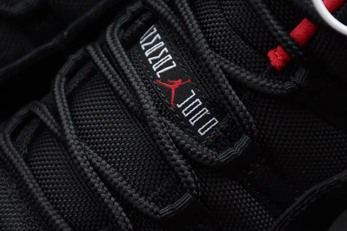 Air Jordan 11 Retro Low "Bred" Black/ Red mens 528895-012