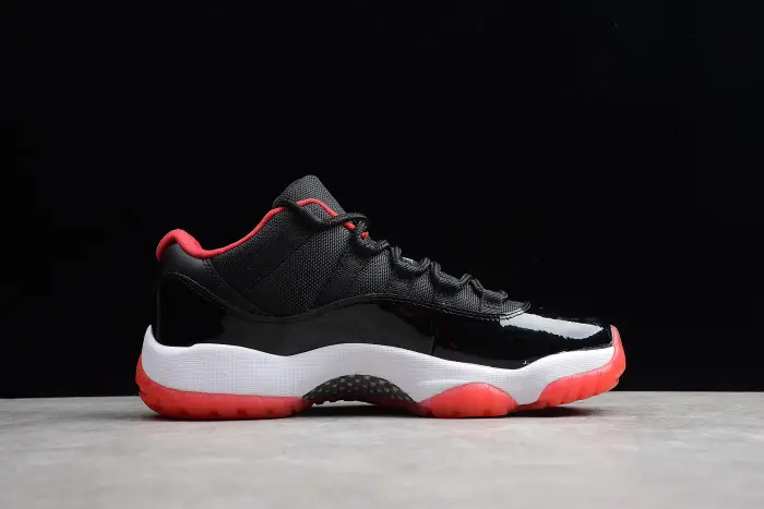 Air Jordan 11 Retro Low "Bred" Black/ Red mens 528895-012